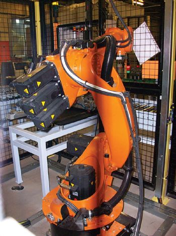 Robot-assisted cylinder head assembly