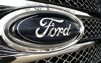 Ford profits to drop in first quarter