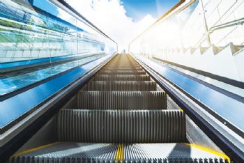 Escalator firm moves on up