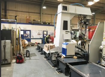 Third robotic welding system for AET