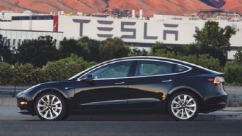 Tesla boosts Model 3 production