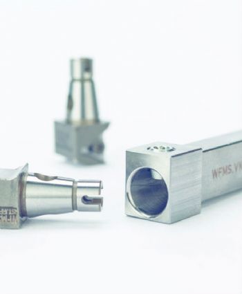 Interchangeable-head tooling system