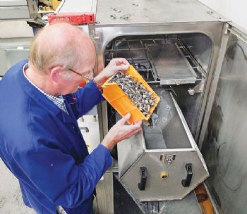 Cleaning swarf from blind holes