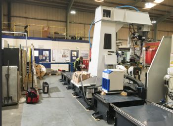Third robotic welding system for AET