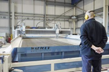 Fabrication fimr invests in new water-jet cutter