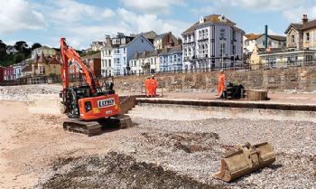 Work has restarted on new sea wall  