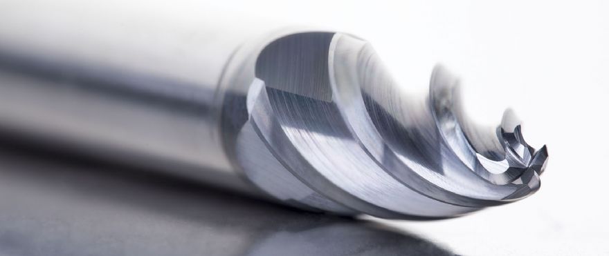Barrel-shaped end mill halves machine time