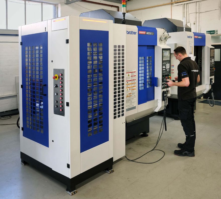 Five-axis machining cell features robotic workpiece magazine