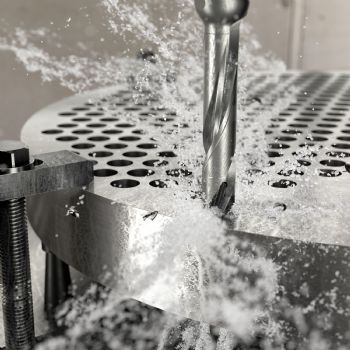 Exchangeable-tip drill for high-volume hole-making