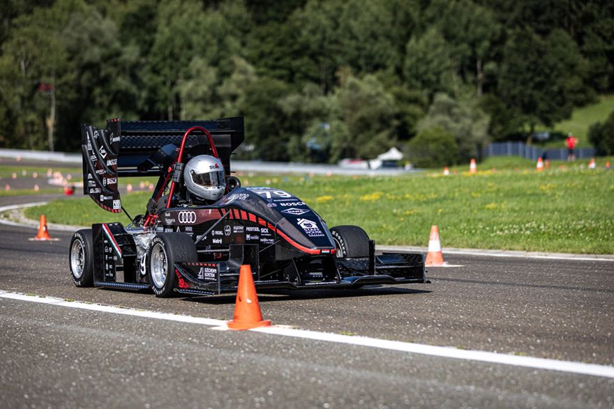 Chell on pole with Hungarian Formula Student Electric Team