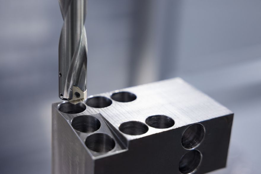 World-first drill with a double-sided indexable insert