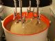 Drag finishing polishes targeted surface areas on hip stems